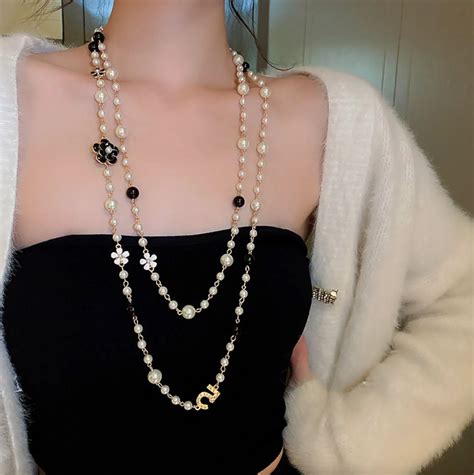 chanel dupe ring|Chanel knockoff pearl necklace.